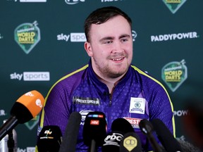 Runner-up Luke Littler of England speaks to the media in the post match press conference after losing to Luke Humphries.