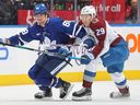 Nathan MacKinnon of the Colorado Avalanche skates against William Nylanderof the Toronto Maple Leafs during the second period of an NHL game at Scotiabank Arena on January 13, 2024.