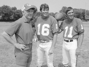 Y.A. Tittle with quarterback Norm Snead (16) and Randy Johnson (11) at training camp in West Long Beach, New Jersey, July 30, 1973.