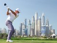 Rory McIlroy of Northern Ireland tees off on the eighth hole during Round One of the Hero Dubai Desert Classic.