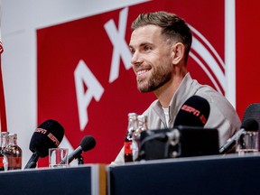 Ajax's newly recruited player, Jordan Henderson gives a press conference during his official presentation.