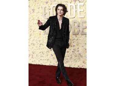 Timothee Chalamet arrives for the 81st annual Golden Globe Awards at The Beverly Hilton hotel in Beverly Hills, Calif., on Jan. 7, 2024.