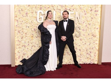 Lily Gladstone and Leonardo DiCaprio attend the 81st Annual Golden Globe Awards at The Beverly Hilton on Jan. 7, 2024 in Beverly Hills, Calif.