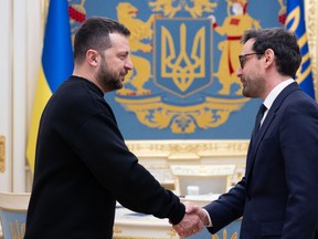 Ukrainian President Volodymyr Zelensky (L) and the new French Foreign and European Affairs Minister Stephane Sejourne (R) met in Kyiv amid the Russian invasion of Ukraine on Jan.13, 2024.