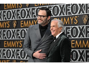 Henry Winkler and Bill Hader arrive for the 75th Emmy Awards at the Peacock Theatre at L.A. Live in Los Angeles on Jan. 15, 2024.