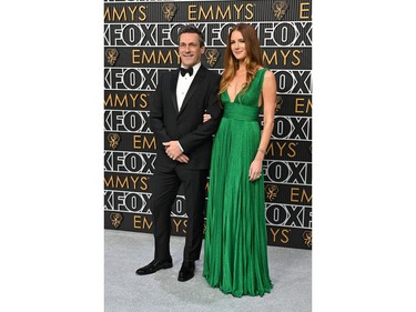 Jon Hamm and wife Anna Osceola arrive for the 75th Emmy Awards at the Peacock Theatre at L.A. Live in Los Angeles on Jan. 15, 2024.