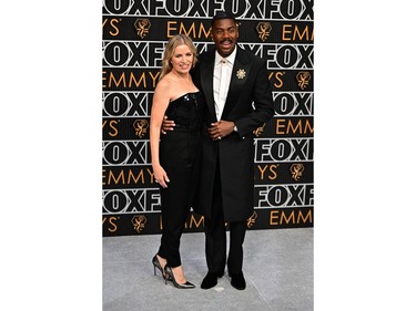 Colman Domingo and Kim Dickens arrive for the 75th Emmy Awards at the Peacock Theatre at L.A. Live in Los Angeles on Jan. 15, 2024.