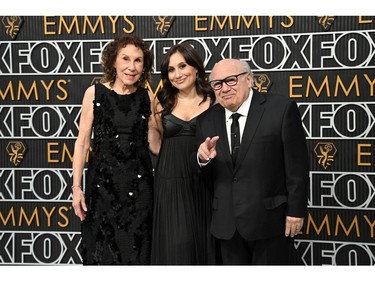 Rhea Perlman, Lucy DeVito, and Danny DeVito arrive for the 75th Emmy Awards at the Peacock Theatre at L.A. Live in Los Angeles on Jan. 15, 2024.