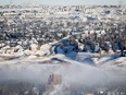 An ice fog hangs over steaming neighbourhoods