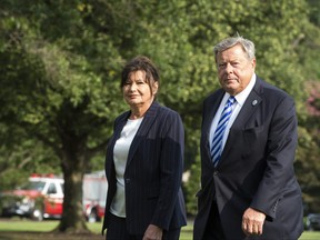 U.S. First Lady Melania Trump's parents, Viktor (right) and Amalija Knavs arrive on the South Lawn upon their return to the White House after a weekend in Bedminster, in Washington, D.C. on Aug. 19, 2018.