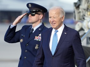 President Joe Biden arrives at Miami International Airport