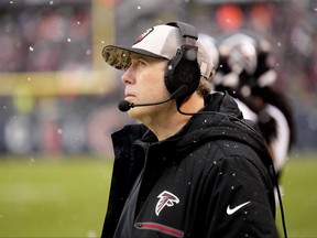 Atlanta Falcons heads coach Arthur Smith looks up at the scoreboard in the closing moment of his team's 37-17 loss to the Chicago Bears in an NFL football game Sunday, Dec. 31, 2023, in Chicago.