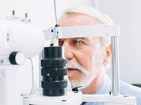 Senior patient having his vision checked.