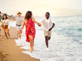 Couples are inviting their friends to join them on their honeymoons.