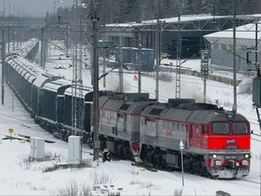 In this file photo, a Russian locomotive pulls freight cars towards Russia at the Vainikkala rail yard in Lappeenranta, southeastern Finland, on Nov. 29, 2023.