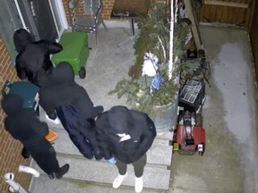 Framegrab of a group of four armed individuals who gained entry into a home on Monday, Jan. 15 at 2:21 a.m. in the Beechgrove and Coronation Dr. area of Highland Creek in Scarborough.