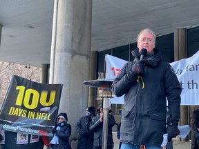 Toronto Sun columnist Warren Kinsella speaks at a rally.