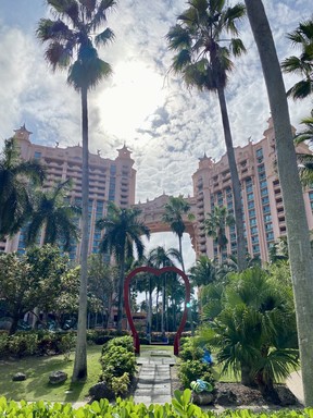 The Heart Swing with the newly renovated iconic Royal Towers as backdrop at Atlantis Paradise Island.