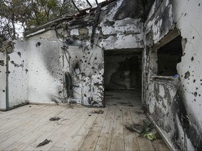 A battle-scarred home in Kibbutz Be'eri, an Israeli communal farm on the Gaza border, is seen Thursday, Jan. 11, 2024.