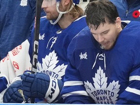 Maple Leafs goaltender Ilya Samsonov reacts on the bench after being pulled from the game after conceding four goals against Tampa Bay Lightning during the first period in Toronto on Monday, Nov. 6, 2023.