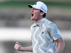 Nick Dunlap of the United States reacts to winning The American Express on the 18th green at Pete Dye Stadium Course on Jan. 21, 2024 in La Quinta, Calif.