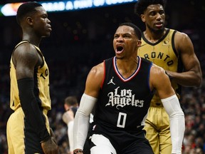 Clippers guard Russell Westbrook (centre) reacts after scoring during first half NBA action against the Raptors in Toronto, Friday, Jan. 26, 2024.