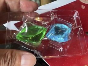 This image taken from video shows liquid laundry detergent balls inside a package given by Nationalist Party (KMT) as a gift for supporter in Chunghwa, Central Taiwan, Saturday Jan. 6, 2024.