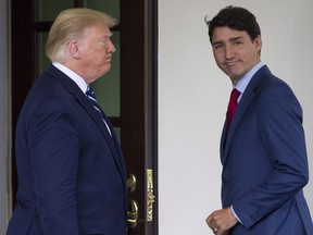 Then US President Donald Trump and Prime Minister Justin Trudeau at the White House, Thursday, June 20, 2019, in Washington. (AP Photo/Alex Brandon)