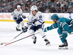 Maple Leafs forward William Nylander (88) skates with the puck while Sharks forward Tomas Hertl (48) defends during first period NHL action at SAP Center in San Jose, Calif., Saturday, Jan. 6, 2024.