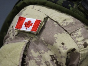 Canadian flag patch on military uniform