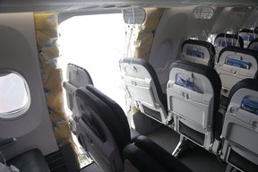 This handout picture provided by the NTSB on Jan. 8, 2024 shows the investigation involving Alaska Airlines Flight 1282 on a Boeing 737-9 MAX in Portland, Oregon.