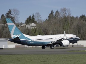 FILE - A Boeing 737 MAX 7 takes off on its first flight, Friday, March 16, 2018, in Renton, Wash. Boeing is asking federal regulators to exempt a new model of its 737 Max airliner from a safety standard designed to prevent part of the engine housing from overheating and breaking off during flight. Boeing needs the exemption to begin delivering the new, smaller Max 7 to airlines.
