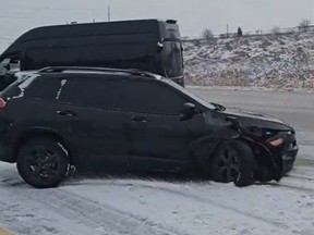 Car facing oncoming traffic on Hwy. 407 after getting bounced around while trying to pass snow plow.
