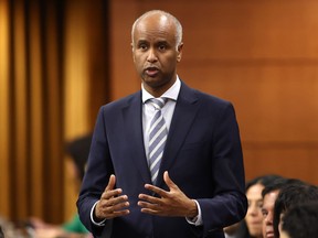 International Development Minister Ahmed Hussen rises during Question Period in the House of Commons on Parliament Hill in Ottawa, Monday, Oct. 16, 2023. Canada is following the U.S. in suspending funding for the United Nations agency that supports Palestinians over allegations some of the agency's staff played a role in the brutal attack Hamas committed in Israel last fall.