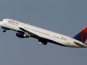 FILE - A Delta Airlines Boeing 757 taking off in Tampa, Fla. on Jan. 20, 2011. A Boeing 757 jet operated by Delta Air Lines lost a nose wheel while preparing for takeoff from Atlanta over the weekend, according to the Federal Aviation Administration, which is investigating the incident.