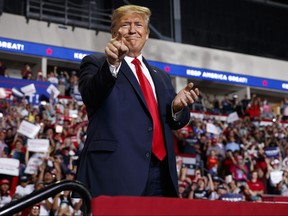 In this Sept. 16, 2019, file photo, Republican President Donald Trump arrives to speak at a campaign rally at the Santa Ana Star Center in Rio Rancho, N.M.