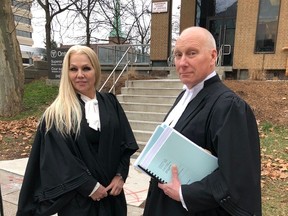 Criminal defence lawyer Laura Joy and assistant Crown attorney Tim Kavanagh are shown outside the Superior Court of Justice building in downtown Windsor following the sentencing hearing on Monday, Jan. 8, 2024, for former Windsor denturist Mario Mouamer, convicted of the sexual assaults of 10 former patients.