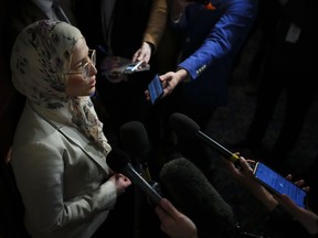 Amira Elghawaby speaks with reporters on Parliament Hill in Ottawa on Wednesday, Feb. 1, 2023.