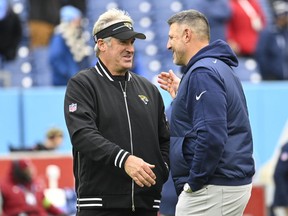 Jacksonville Jaguars head coach Doug Pederson, left, greets Tennessee Titans head coach Mike Vrabel, right, before an NFL football game Sunday, Jan. 7, 2024, in Nashville, Tenn.