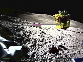This image provided by the Japan Aerospace Exploration Agency (JAXA)/Takara Tomy/Sony Group Corporation/Doshisha University shows an image taken by a Lunar Excursion Vehicle 2 (LEV-2) of a robotic moon rover called Smart Lander for Investigating Moon, or SLIM, on the moon.