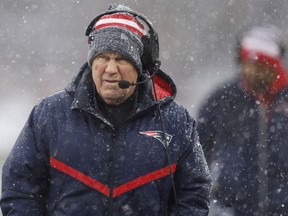 New England Patriots head coach Bill Belichick watches from the sideline during the first half of an NFL football game against the New York Jets, Sunday, Jan. 7, 2024, in Foxborough, Mass.