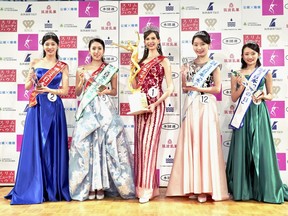 Contestants including Carolina Shiino, who won the Miss Nippon (Japan) Grand Prix, centre, pose for a photo after the contest in Tokyo, Monday, Jan. 22, 2024.