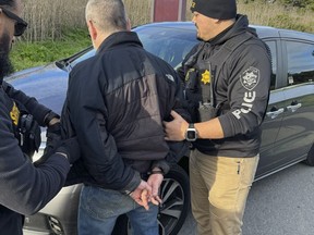 In this photo provided by the Capitola Police Department, Theobald "Theo" Lengyel is taken into custody in Capitola, Calif., on Tuesday, Jan. 2, 2024.