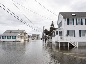 Homes are surrounded by flood waters in Hampton, New Hampshire on Jan. 10, 2024.