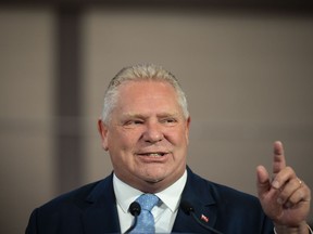 Ontario Premier Doug Ford answers questions during a press conference at the Toronto Police College in Etobicoke, Ont., on Tuesday, April 25, 2023.