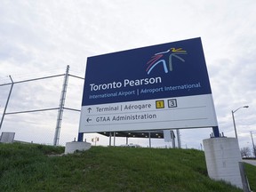 A sign for Toronto Pearson International Airport is pictured in Mississauga April 20, 2023.
