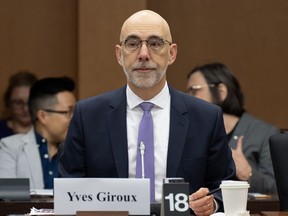 Parliamentary Budget Officer Yves Giroux waits to appear before the Senate Committee on National Finance, Tuesday, Oct. 17, 2023 in Ottawa.
