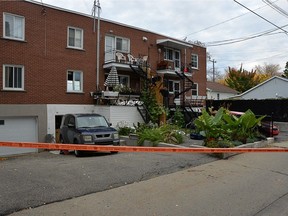 A crime scene photo taken during the murder investigation of Denis Leblanc, the man charged with killing his sisters Diane and Sylvie Leblanc. The two women were killed behind Denis Leblanc's home on Ontario St. E. on Oct. 3, 2020. The photo shows how the bodies, covered in silver blankets, were found on Leblanc's balcony and on a walkway at the back entrance to Leblanc's home.