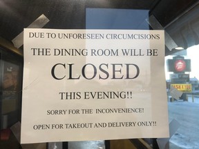 Note at Pizza Hut door of Timmins location that reads: "Due to unforeseen circumcisions..."