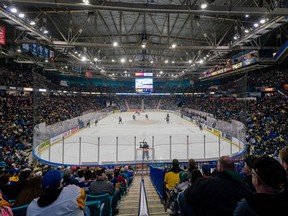 Spectators watch the action at the SaskTel Centre during the second period of WHL playoff hockey action between the Regina Pats and Saskatoon Blades in Saskatoon on Friday, March 31, 2023. A Saskatchewan judge has handed down a three-year sentence to a former Western Hockey League coach guilty of inappropriately touching and hitting a teenage player 35 years ago.